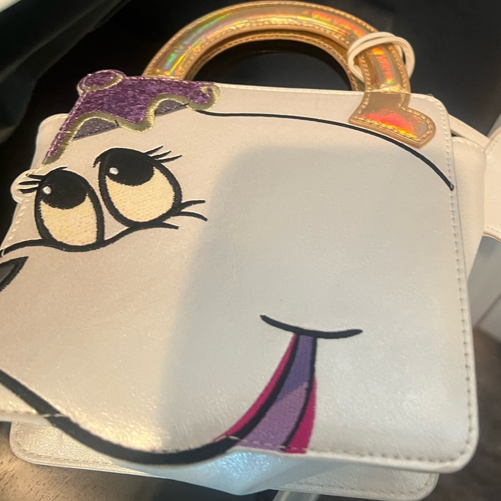 Euc misses Potts Danielle Nicole purse